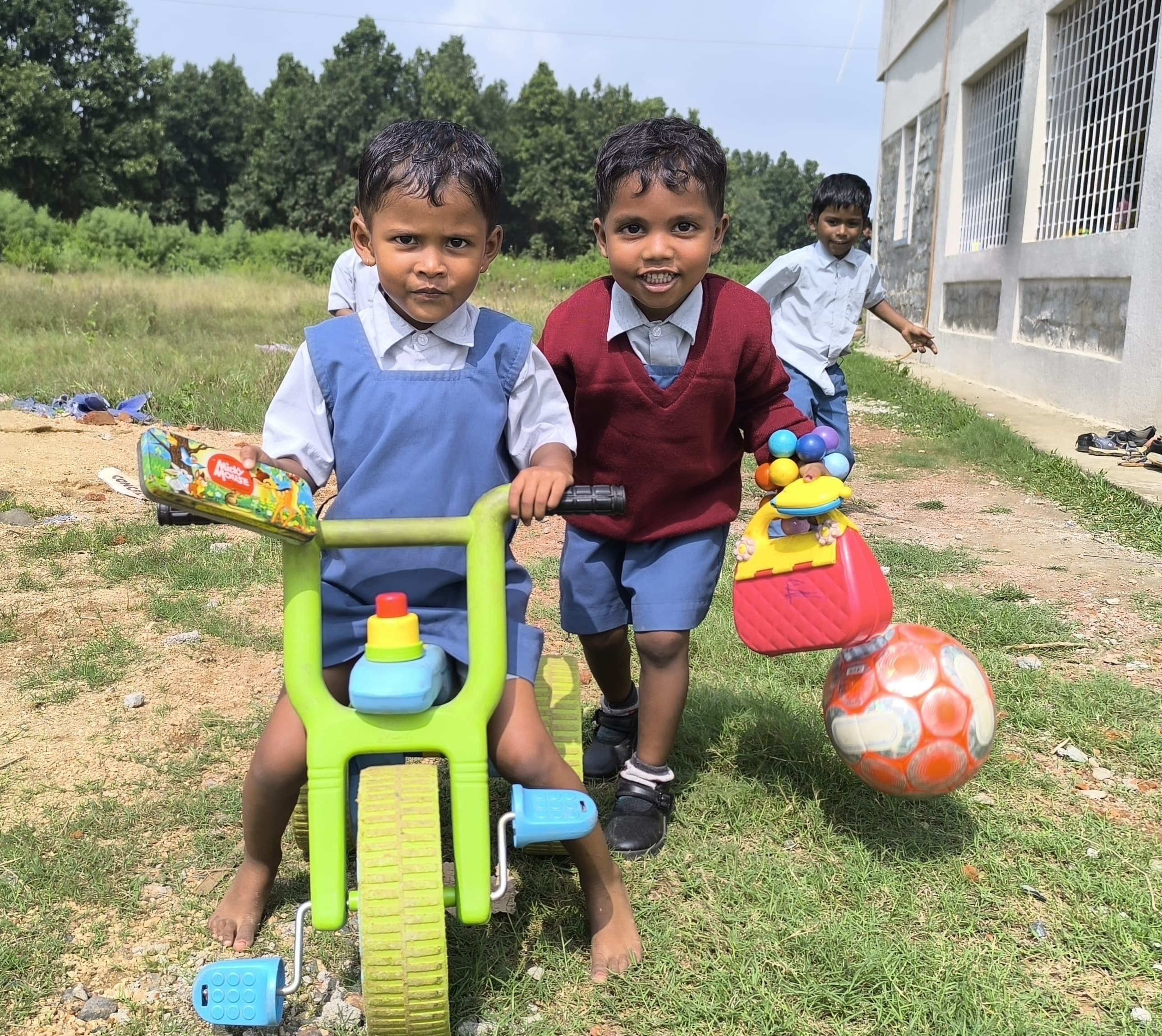 Children playing with toys outdoors